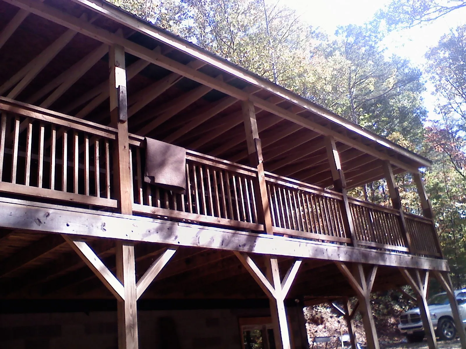Timber framing under a new elevated porch and deck — Roof Leak Repair in Smiley by Roofing Brothers